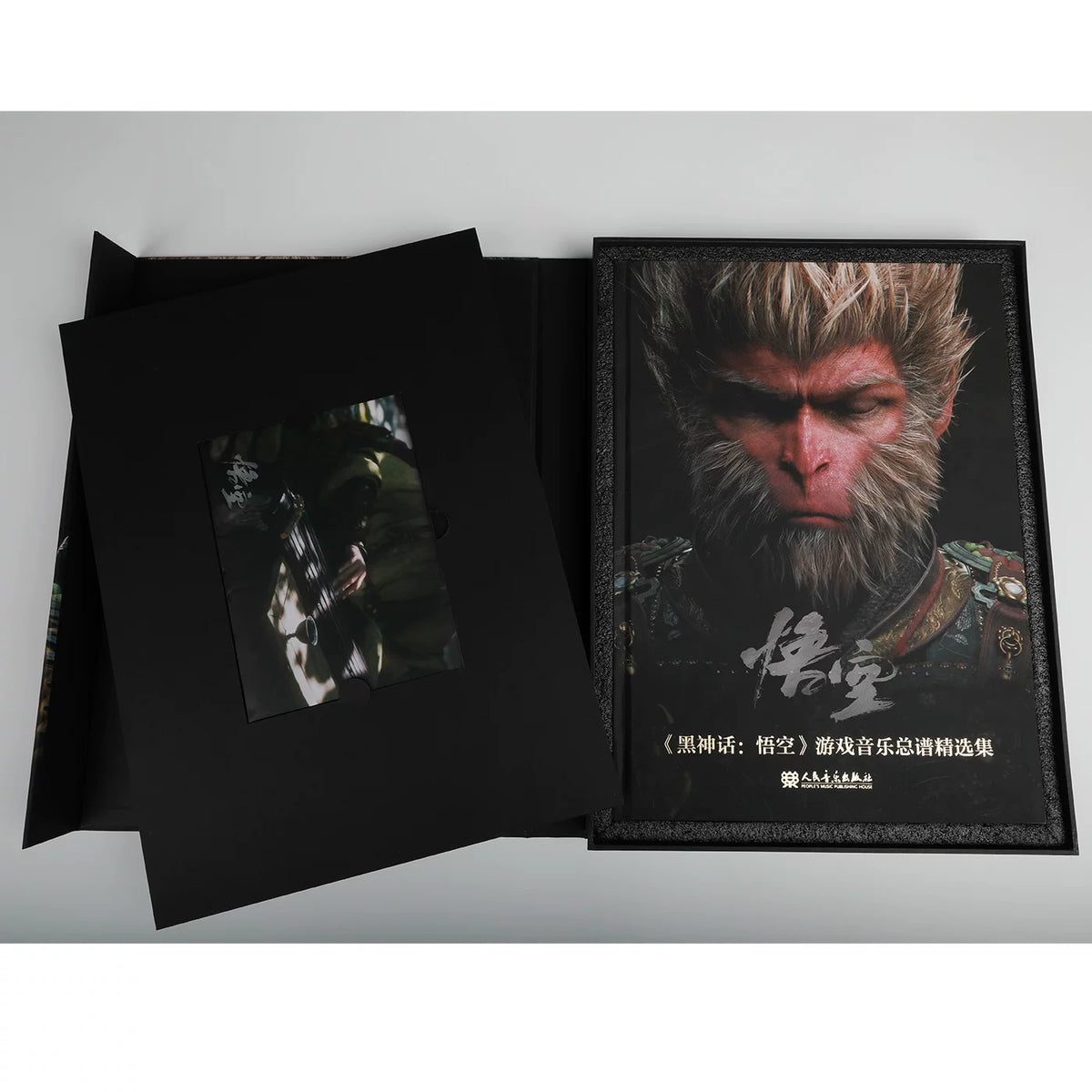 Black Myth Wukong score book book inside open black presentation packaging