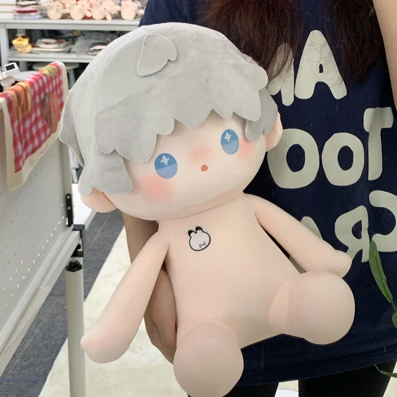 Love and Deepspace Xavier bare cotton plush doll held at a market stall