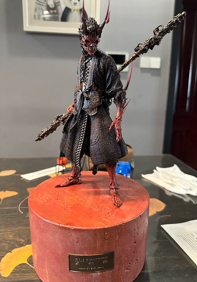 Black Myth: Wukong Destined One and Yaksha King 1/6 statue on base during assembly on a desk