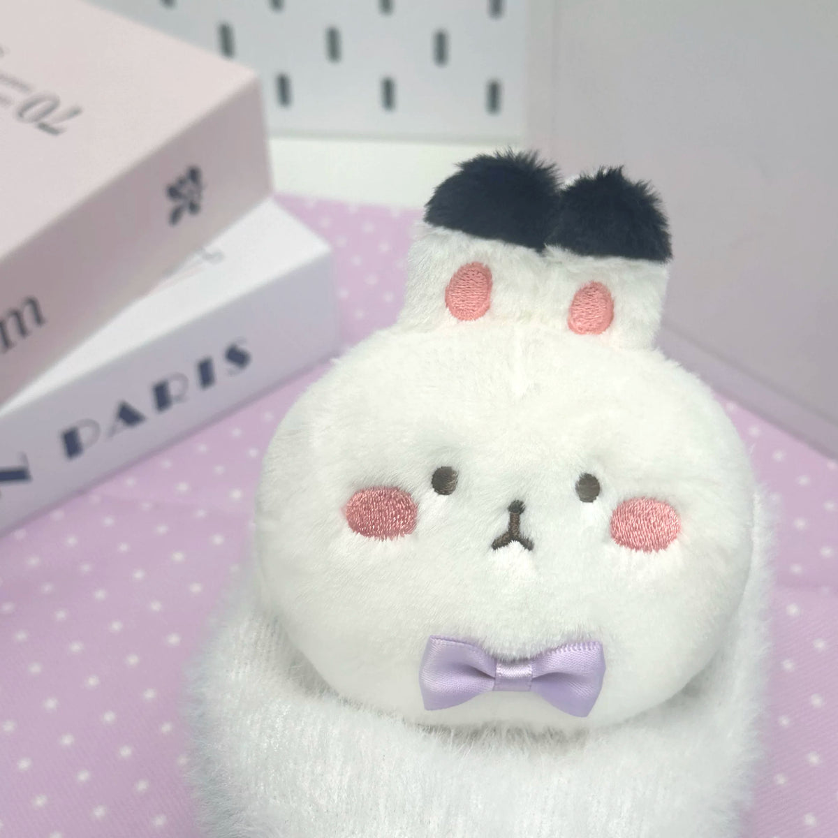 Love and Deepspace Four Mascot Series plush charm white rabbit with purple bow tie close-up