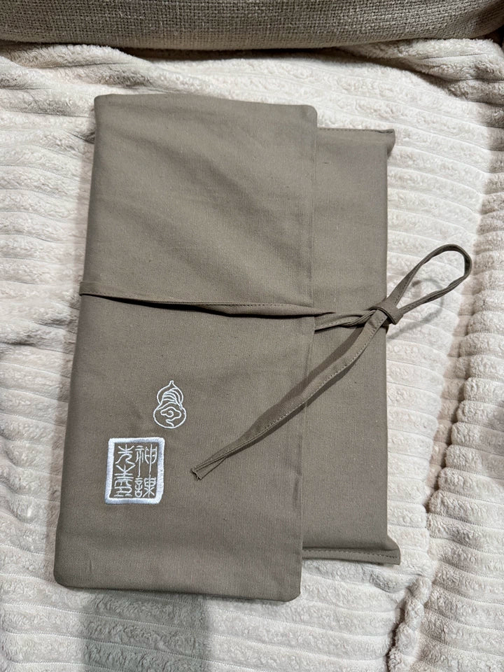 Black Myth Wukong Ying Shen Tu tied cloth wrap showing embroidered emblems