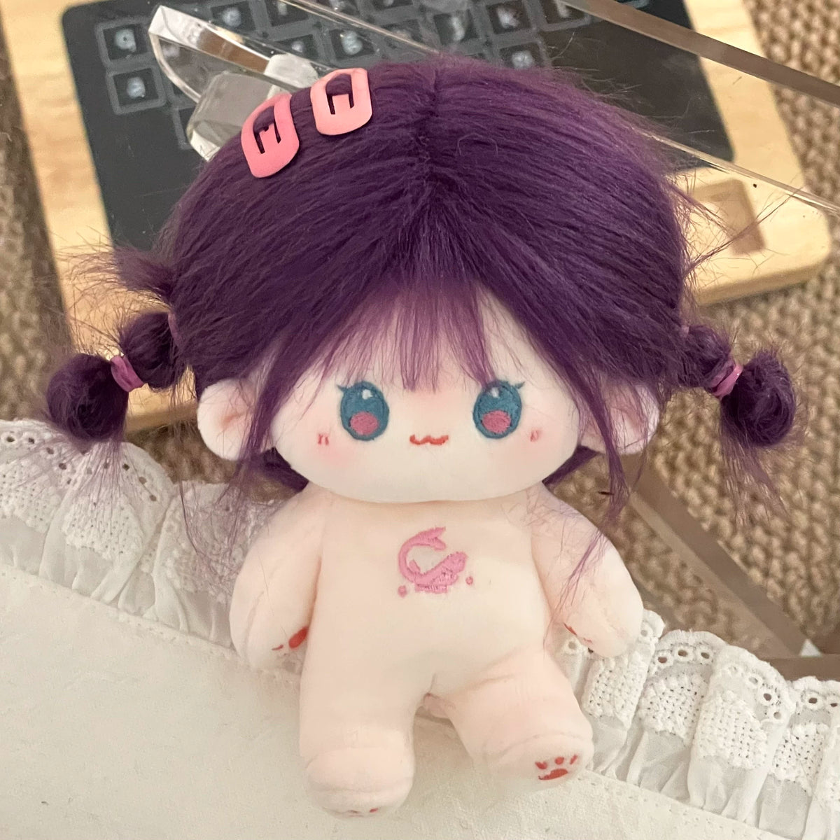 Love and Deepspace Tousled-Hair plush doll purple hair twin tails with pink clips close-up