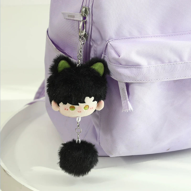 Love and Deepspace Pom-Pom plush charm black hair with pom-pom hanging on bag