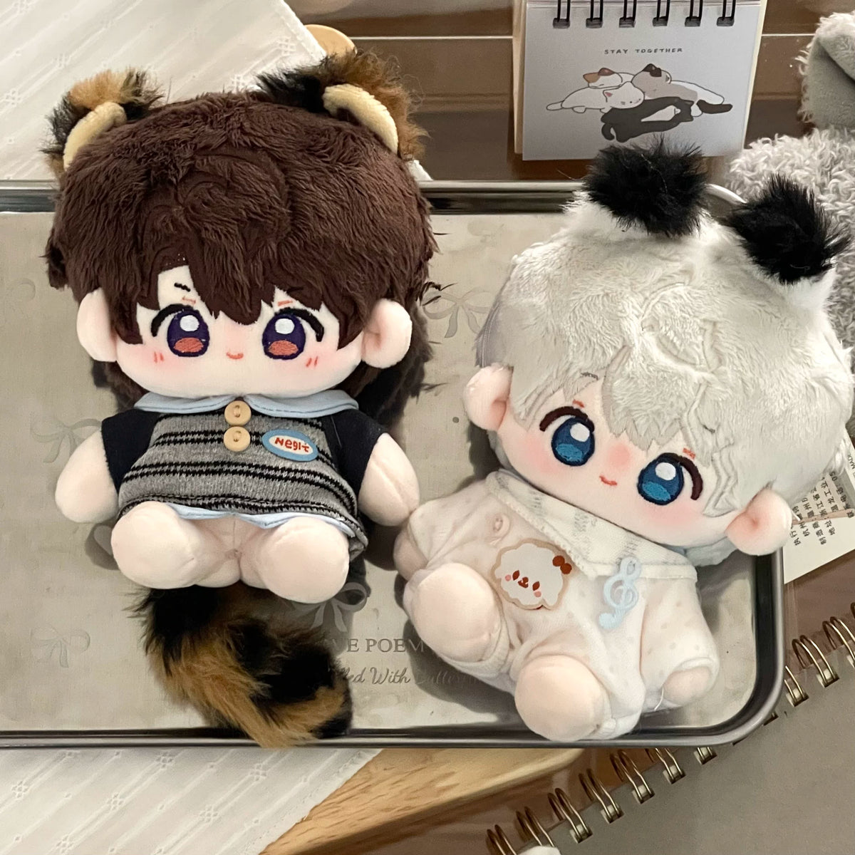 Love and Deepspace magnetic tail plush dolls brown and white hair pair on tray