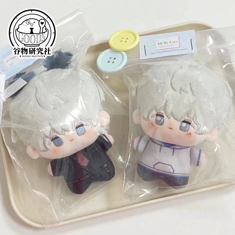 Love and Deepspace Xavier starfish plush dolls packaged on a tray with buttons