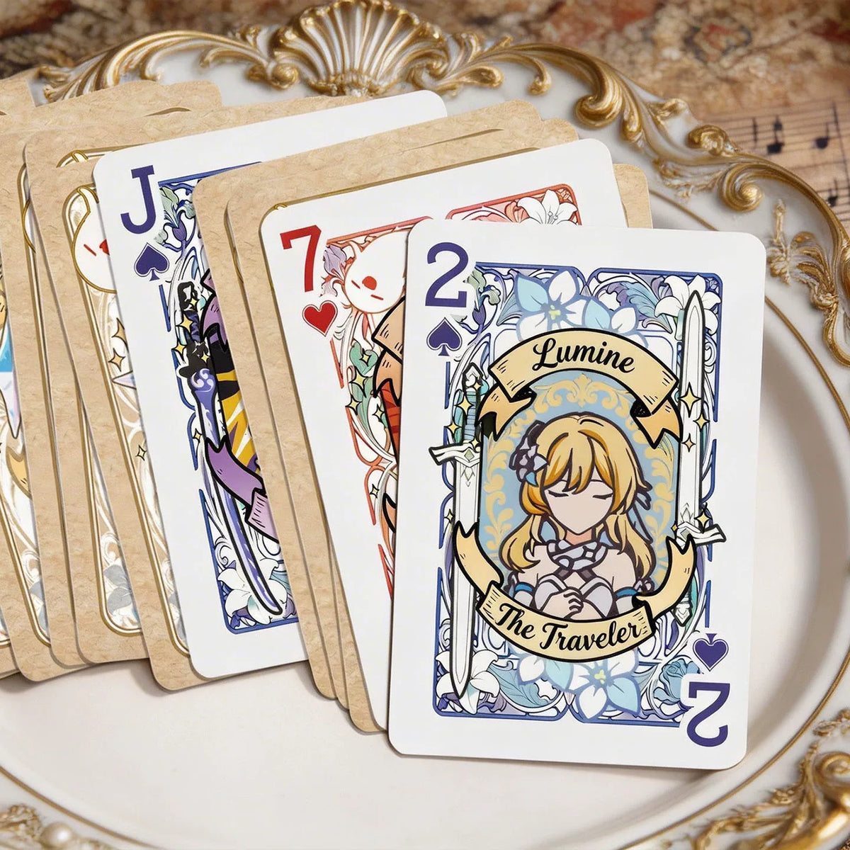 Genshin Impact fan-made playing cards Furina suit fanned out on a plate
