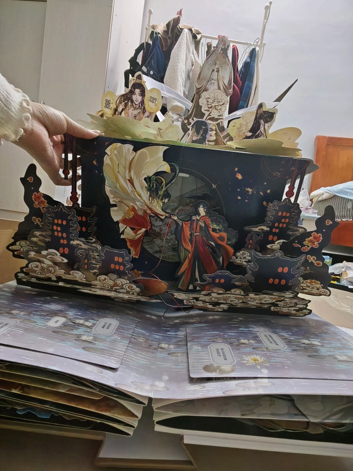 TGCF pop-up book opened divine statue scene on tabletop