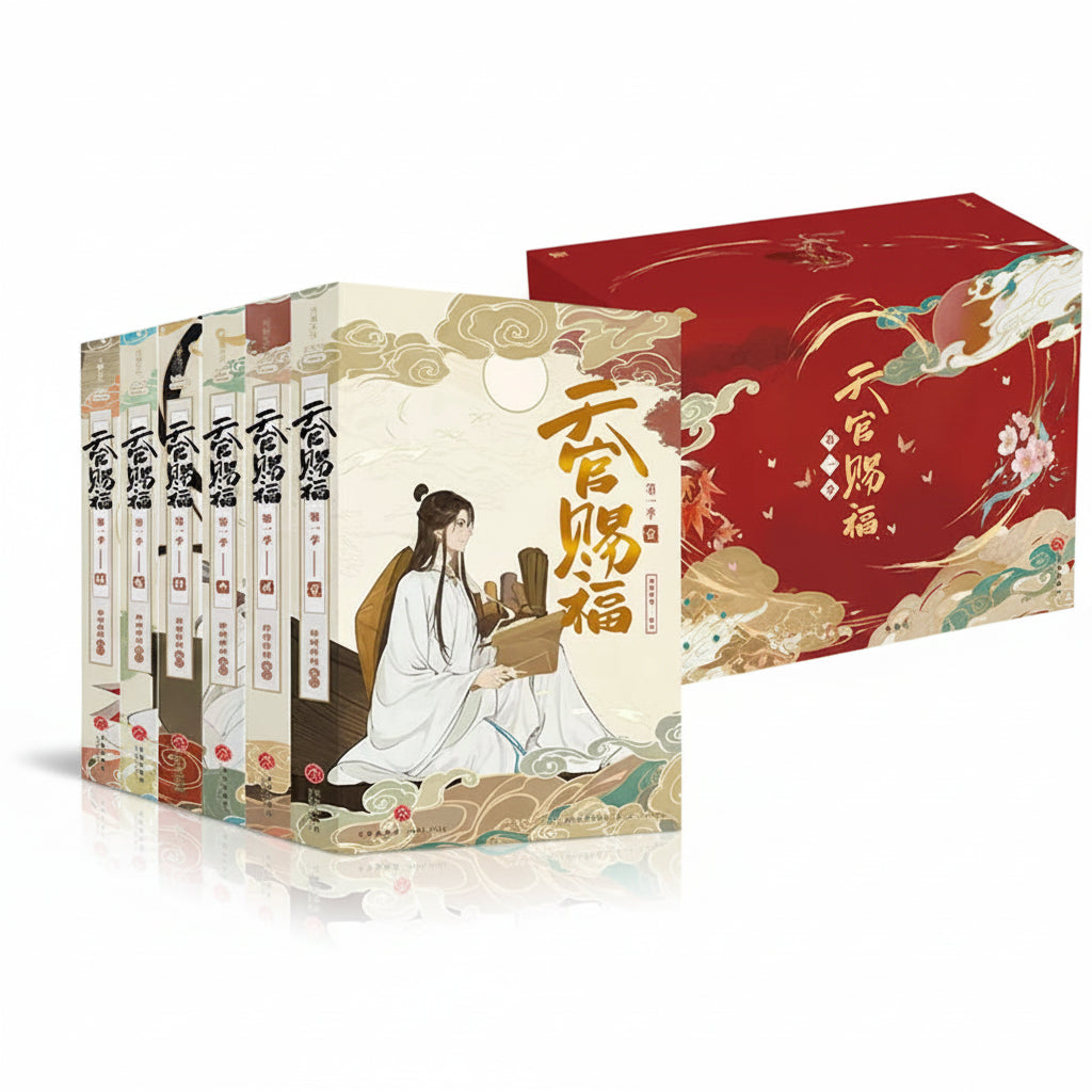TGCF Season One frame comics six-book set beside red collector box