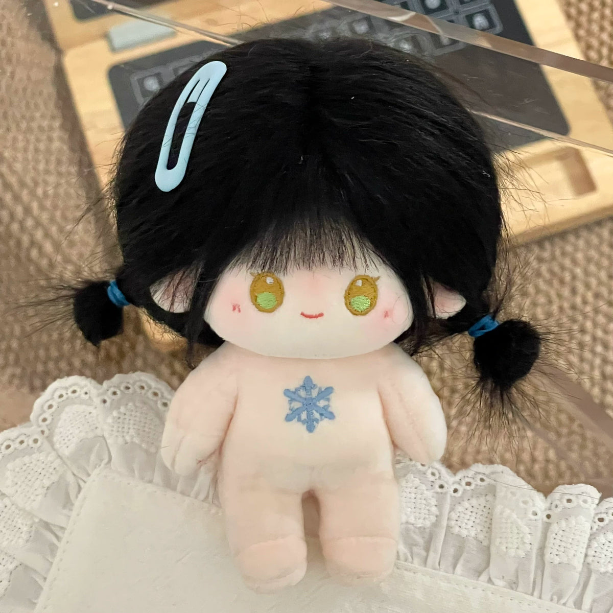 Love and Deepspace Tousled-Hair plush doll black hair twin tails with blue clips close-up