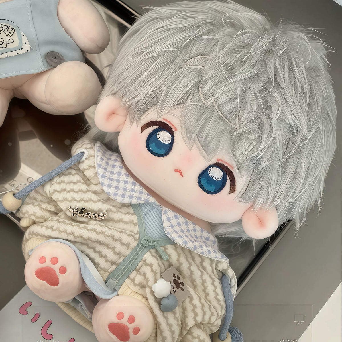 Love and Deepspace 7.87 inch Xavier plush doll lying in knit vest