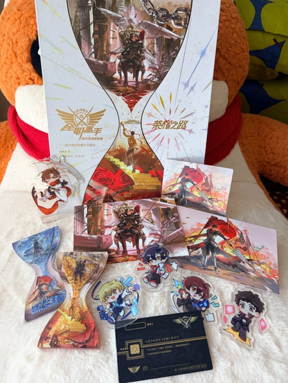 The King's Avatar Road to Glory art book bonus items laid out on a table