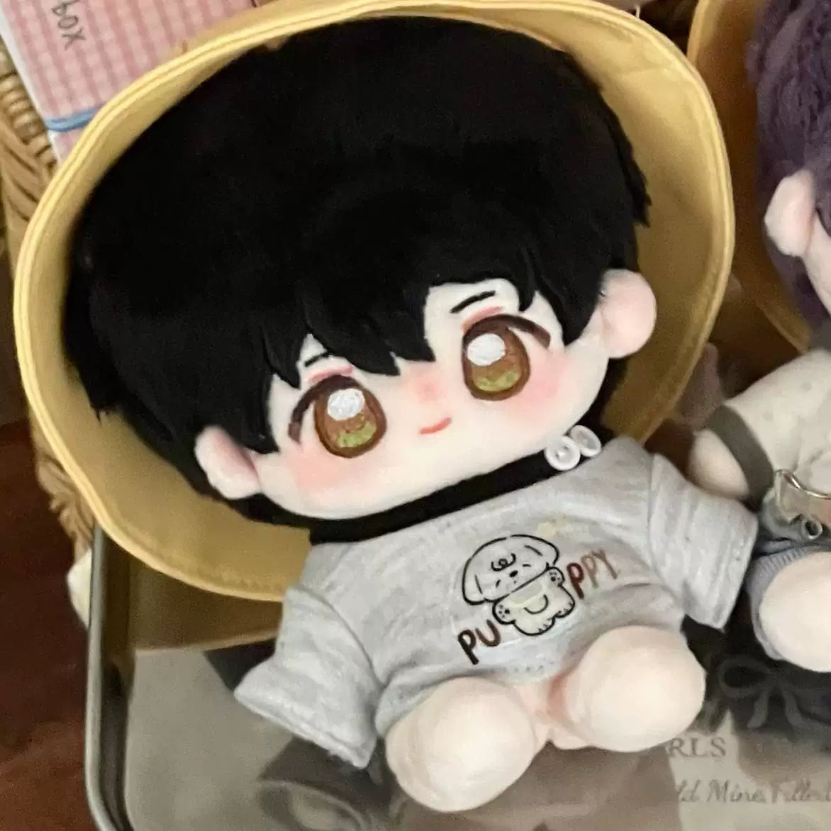 Love and Deepspace Embroidered plush doll black hair in yellow bucket hat sitting