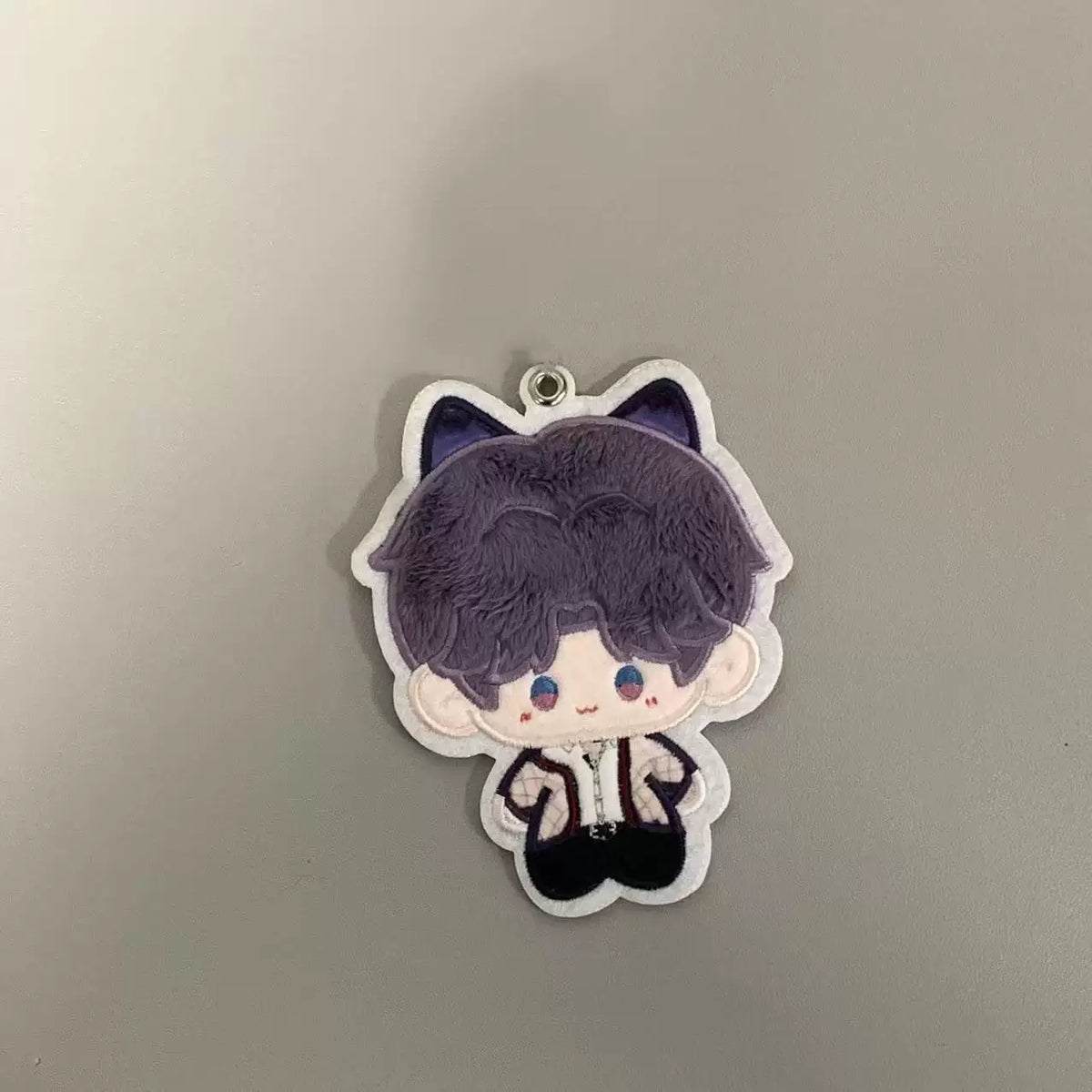 Fan-made Rafayel embroidered plush charm with purple cat-ear design