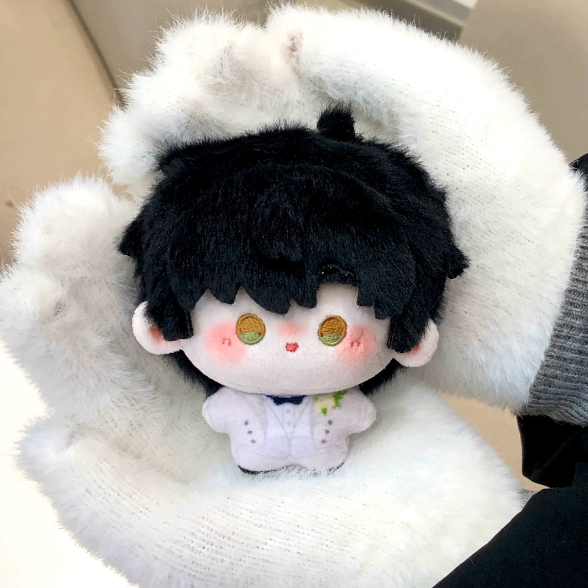 Love and Deepspace Printed plush doll black hair sitting on white fur