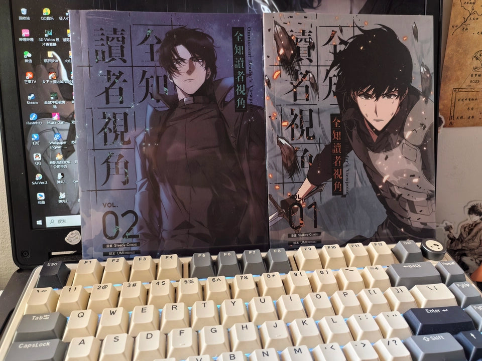 ORV Traditional Chinese manhwa Vol. 1 and Vol. 2 beside keyboard