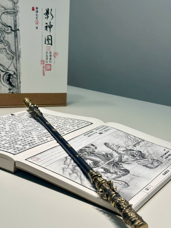 Black Myth Wukong Ying Shen Tu open book beside decorative staff
