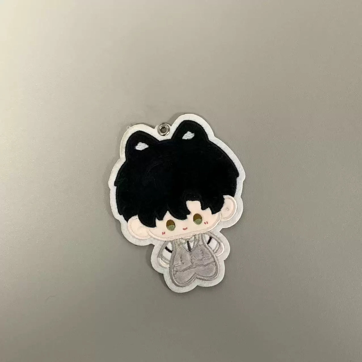 Fan-made Zayne embroidered plush charm with black cat-ear design