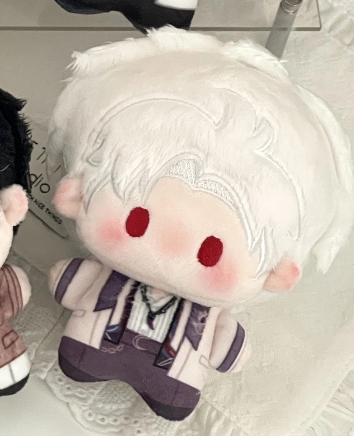 Love and Deepspace Birthday plush charm white hair red eyes doll close-up