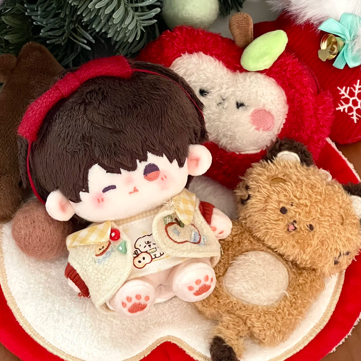 Love and Deepspace Caleb plush doll in red vest with Christmas decorations