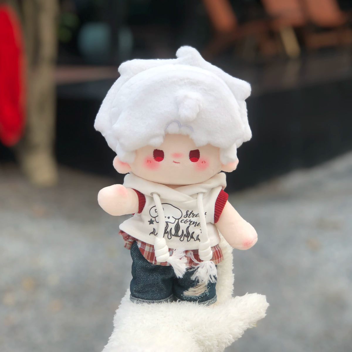Love and Deepspace Manman-Body plush doll white hair red eyes sitting on white fur outdoors