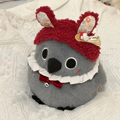 Love and Deepspace Mephisto bird plush wearing red bunny hat and bow tie