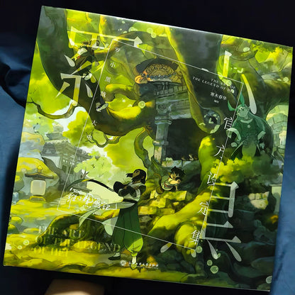 The Legend of Hei movie art setting book cover held in hand
