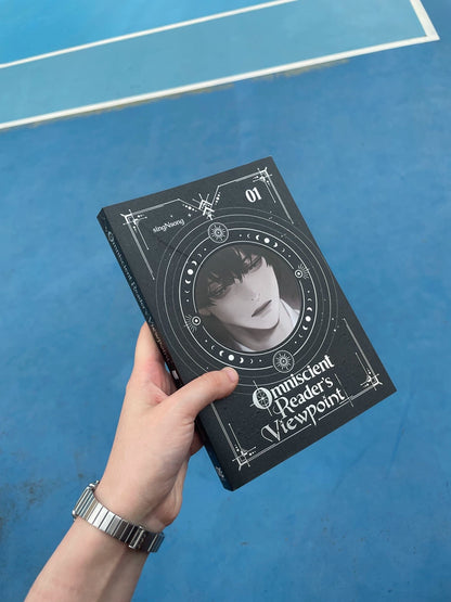 ORV English novels Vol. 1 held over blue floor