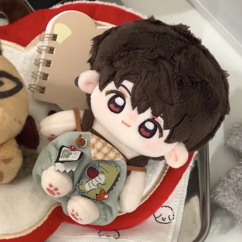 Love and Deepspace Embroidered plush doll brown hair leaning against red bag